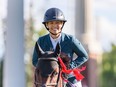 Israel's Ashlee Bond rides Donatello 141 to the first place in the jump-off round of the Pepsi Challenge in the International Ring at Spruce Meadows on Thursday, September 16, 2021. Azin Ghaffari/Postmedia