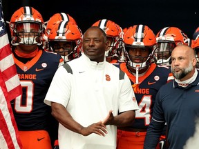 SYRACUSE, NEW YORK - SEPTEMBER 11: Head Coach Dino Babers of the Syracuse Orange takes a moment prior to a game against the Rutgers Scarlet Knights at Carrier Dome on September 11, 2021 in Syracuse, New York.