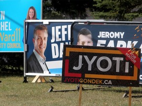 Calgary Municipal election signs are seen along Heritage Dr. SW. Tuesday, September 28, 2021.