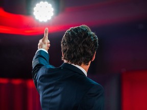 Prime Minister Justin Trudeau gives a thumbs up as he arrives to deliver his victory speech after snap parliamentary elections at the Fairmount Queen Elizabeth Hotel in Montreal early on September 21, 2021.