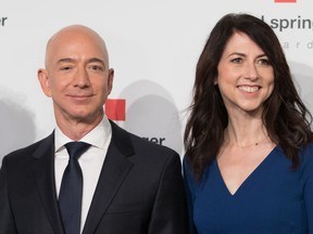 Amazon CEO Jeff Bezos and then-wife MacKenzie Bezos pose as they arrive at the headquarters of publisher Axel-Springer where he received the Axel Springer Award 2018 on April 24, 2018 in Berlin.
