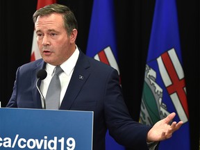 Premier Jason Kenney answering questions on the cabinet shuffle appointing Jason Copping as the new Minister of Health during a news conference in Edmonton, September 21, 2021.