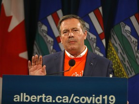 Premier Jason Kenney, along with Health Minister Jason Copping provide an update on COVID-19 and the ongoing work to protect public health at the McDougall Centre in Calgary on Thursday, September 30, 2021.