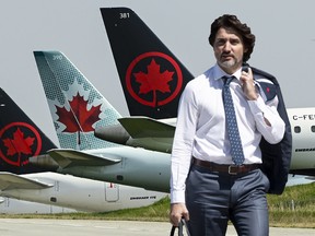 Grounded Air Canada planes sit on the tarmac at Pearson International Airport during the COVID-19 pandemic in Toronto on Wednesday, April 28, 2021.