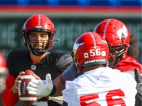 Calgary Stampeders quarterback Jake Maier looks to throw the ball during practice in Calgary on Saturday.