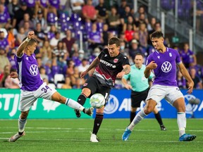Cavalry FC (in black) battles Pacific FC in Canadian Premier League action at Starlight Stadium in Langford, B.C., on Thursday, Sept. 9, 2021.