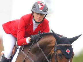 Canada's Tiffany Foster riding Northern Light during the BMO Nations' Cup at the Spruce Meadows Masters in Calgary on Saturday, September 11, 2021. Al Charest / Postmedia