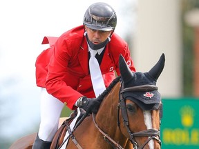 Canada's Eric Lamaze riding Fine Lady 5 during the BMO Nations' Cup at the Spruce Meadows Masters in Calgary on Saturday, September 11, 2021. Al Charest / Postmedia