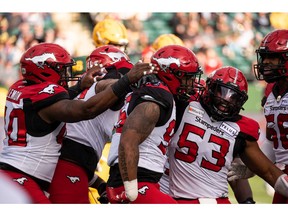 Calgary Stampeders' Stefen Banks (95) is celebrated by teammates during first half CFL football action versus the Edmonton Elks at Commonwealth Stadium in Edmonton, on Saturday, Sept. 11, 2021. Photo by Ian Kucerak