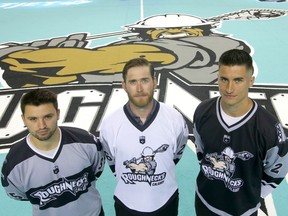 Roughnecks goaltender Christian Del Bianco, forward Dan Taylor and defender Reece Callies model the newly branded team jerseys in Calgary on Wednesday.