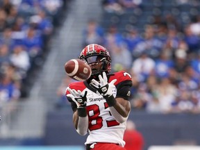 Calgary Stampeders WR Josh Huff pulls in a pass  during CFL action against the Winnipeg Blue Bombers at IG Field in Winnipeg in this photo from Sunday, Aug. 29.