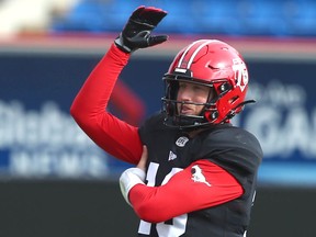 Calgary Stampeders quarterback Bo Levi Mitchell stretches during practice at McMahon Stadium in Calgary on Thursday, Sept. 30, 2021.