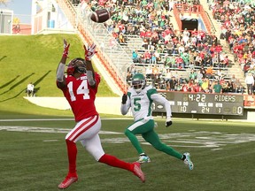 The Calgary Stampeders’ Shawn Bane makes a catch for a touchdown against the Saskatchewan Roughriders at McMahon Stadium in Calgary on Saturday, Oct. 2, 2021.