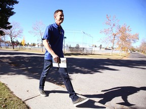 Calgary mayoral candidate Jeff Davison pounds the pavement while door knocking in the Fairview neighbourhood in southeast Calgary Sunday, October 3, 2021.