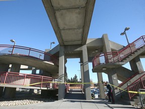 Calgary Police and emergency personnel lock down the scene of a serious stabbing at 36 St and Marlborough Dr / 8 Ave NE, near the Marlborough LRT station in Calgary on Wednesday, October 27, 2021. What is believed to be the victim's clothing is shown on northbound 36 St.