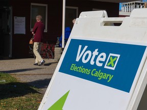 Calgarians in Ward 9 vote at the advance municipal election poll station at the the Rehabilitation Society of Calgary in Bridgeland on Monday, October 4, 2021.