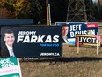 Campaign signs showing three of the frontrunners in the race for Calgary’s next mayor are seen along 66th Avenue S.W. in Lakeview on Tuesday, October 12, 2021.
