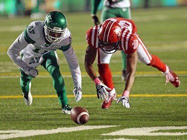 Calgary Stampeders wide receiver Kamar Jorden and the Saskatchewan Roughriders’ Ed Gainey race for fumble during CFL action at McMahon Stadium in Calgary on Saturday, October 23, 2021. Gavin Young/Postmedia
