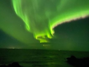The aurora borealis captured above Lake Winnipeg by twitter user @willjfawley