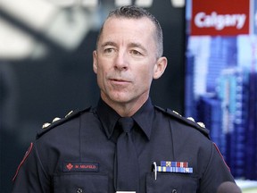 Mark Neufeld, Calgary Police Chief, speaks to reporters after a day of discussion at City Hall on future policing budgets in Calgary. Thursday, Sept. 10, 2020.