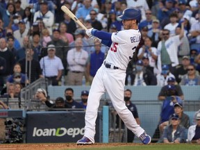 Los Angeles Dodgers first baseman Cody Bellinger hits a three-run home run in the eighth inning of Game 3 of the 2021 NLCS against the Atlanta Braves at Dodger Stadium on Oct. 19, 2021.