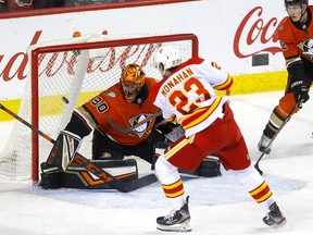 Calgary Flames forward Sean Monahan scores on Anaheim Ducks goaltender Ryan Miller at the Scotiabank Saddledome in Calgary on Feb. 17, 2020.