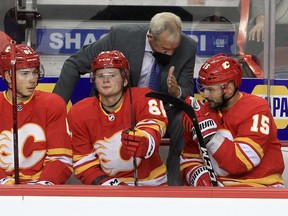 Flames head coach Darryl Sutter is seen behind the bench at the Saddledome on Friday, Oct. 1, 2021.