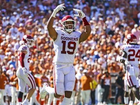 Caleb Kelly (19) reacts during the fourth quarter against the Texas Longhorns at the Cotton Bowl in Dallas on Saturday, Oct. 9, 2021