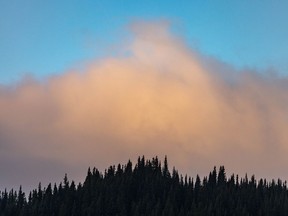 Clouds blow over the mountains south of Longview, Ab., on Tuesday, October 19, 2021. Mike Drew/Postmedia
