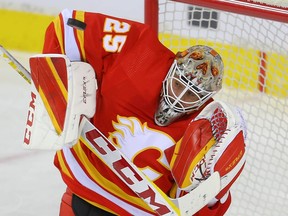 Calgary Flames goaltender Jacob Markstrom makes a save against the Philadelphia Flyers at the Scotiabank Saddledome in Calgary on Saturday, Oct. 30, 2021.
