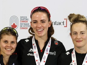 Calgary's Brooklyn McDougall took first place in the women’s 500-metre long-track event, followed by Marsha Hudey (Saskatchewan), left, in second, and Kaylin Irvine (Alberta) in third at the Canadian Championships at the Olympic Oval in Calgary on Wednesday.
