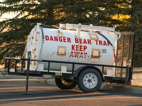 A bear trap was parked in South Glenmore Park awaiting possible use after a bear and cub were spotted in the Cedarbrae and Oakridge communities, near the border of the Tsuut’ina Nation in Calgary on Tuesday, Oct. 12, 2021.