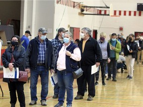 Voters in Ward 11 cast their ballots inside Haysboro Catholic High School in the SW. Monday, October 18, 2021.