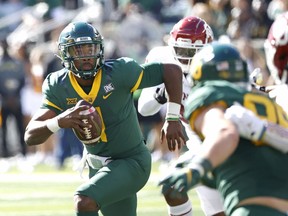 Gerry Bohanon of the Baylor Bears looks to pass against the Oklahoma Sooners at McLane Stadium in Waco, Texas, on Saturday, Nov.  13, 2021.