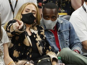 Singer Adele looks on during the first half in Game Five of the NBA Finals between the Milwaukee Bucks and the Phoenix Suns at Footprint Center on July 17, 2021 in Phoenix, Arizona.