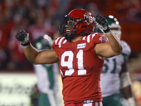 Calgary Stampeders defensive lineman Isaac Adeyemi-Berglund celebrates during a game against the Saskatchewan Roughriders at McMahon Stadium in Calgary on Saturday, Oct. 2, 2021.
