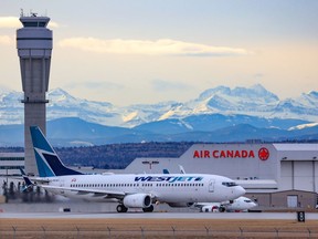 A WestJet Boeing 737 takes off from the Calgary International Airport on Thursday, November 18, 2021.