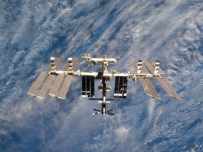In this file photo taken on March 7, 2011, this NASA handout image shows a close-up view of the International Space Station is featured in this image photographed by an STS-133 crew member on space shuttle Discovery after the station and shuttle began their post-undocking relative separation.