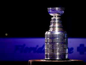 The Stanley Cup is shown before the first period of a game between the Tampa Bay Lightning and Pittsburgh Penguins at Amalie Arena in Tampa, Fla., Oct. 12, 2021.
