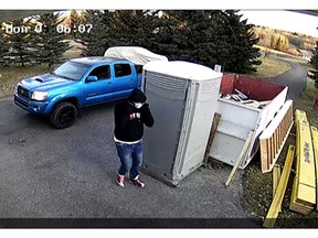 RCMP are looking for these suspects who made off with a trailer loaded with four dirt bikes and other equipment from a home in Cochrane.