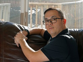 Herman Koo at his home in Edmonton on November 5, 2021. Herman was shot in the head while driving home in 2018 by a man on a random crime spree and was not expected to survive. There have been severe social impacts from the COVID-19 pandemic on people like Herman who live with disabilities.