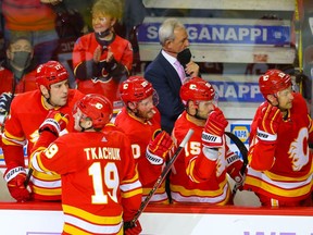 Calgary Flames forward Matthew Tkachuk celebrates with teammates after scoring in a game earlier this season.