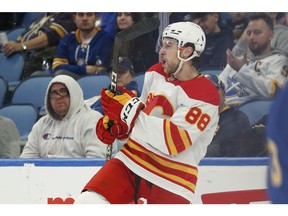 The Calgary Flames’ Andrew Mangiapane celebrates after a goal against the Buffalo Sabres at Keybank Center in Buffalo, N.Y., on Thursday, Nov. 18, 2021.