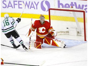 Calgary Flames goalie Jacob Markstrom is scored on by Dallas Stars Jamie Benn in overtime at the Scotiabank Saddledome in Calgary on Thursday, Nov. 4, 2021.