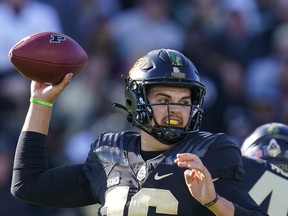 Purdue quarterback Aidan O'Connell throws against Michigan State during the first half of an NCAA college football game in West Lafayette, Ind., Saturday.