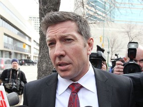Former NHL player Sheldon Kennedy speaks to media outside the Law Courts in Winnipeg in this photo from March 2012 after sentencing for disgraced hockey coach Graham James.