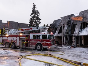 Calgary Fire Department responds to a fire at a townhouse complex at the 4500 block of Montgomery Avenue N.W. on Tuesday, Dec. 21, 2021.