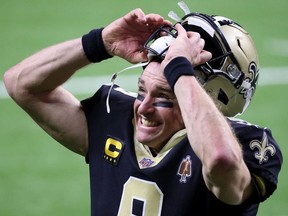 Drew Brees of the New Orleans Saints celebrates after defeating the Chicago Bears with a score of 21 to 9 in the NFC Wild Card Playoff game at Mercedes Benz Superdome on January 10, 2021 in New Orleans, Louisiana.