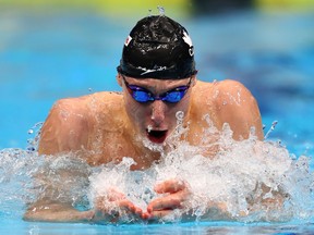 Finlay Knox and Summer McIntosh both broke their own Canadian records and booked their tickets to this summer’s FINA World Championships during Tuesday’s opening night at the Bell Canadian Swimming Trials.