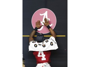 Brian Robinson Jr. of the Alabama Crimson Tide celebrates after the Alabama Crimson Tide defeated the Cincinnati Bearcats 27-6 in the Goodyear Cotton Bowl Classic for the College Football Playoff semifinal game at AT&T Stadium on Dec. 31, 2021, in Arlington, Texas.
